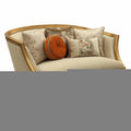 70" Tan And Gold Curved Loveseat and Toss Pillows