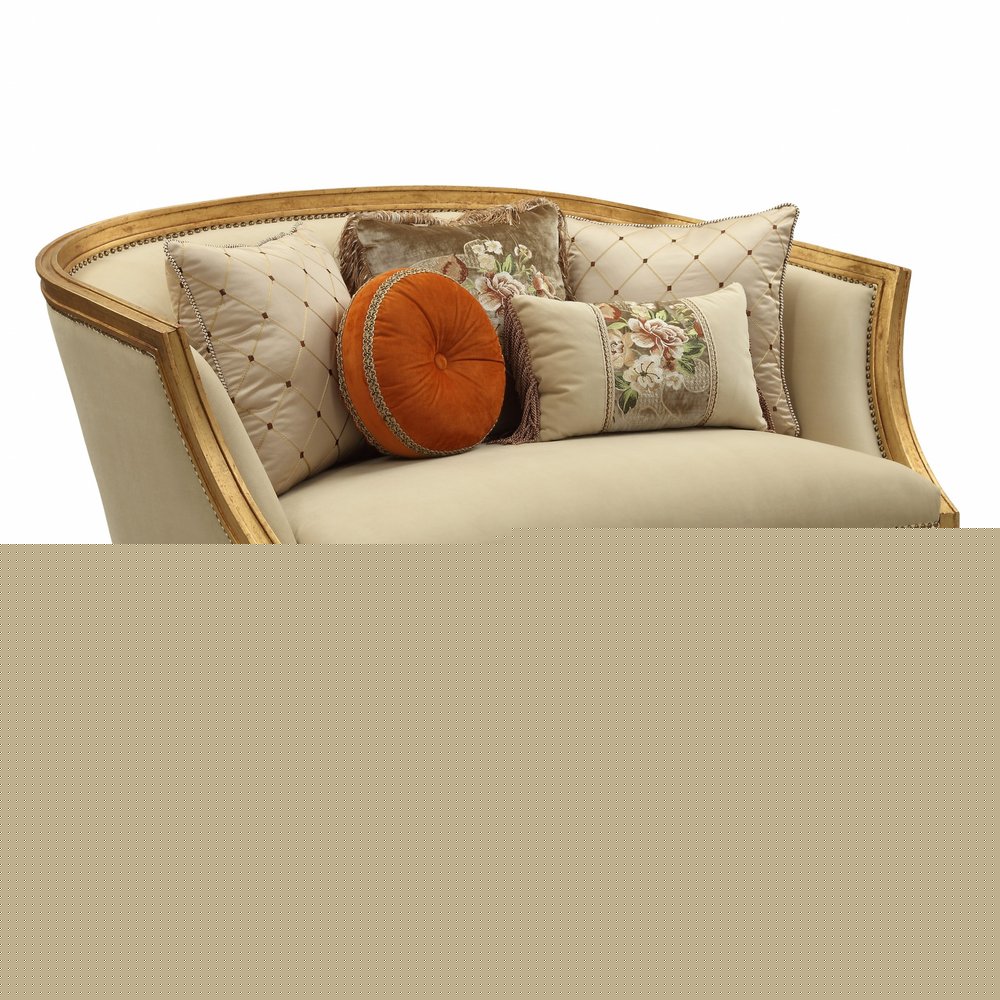 70" Tan And Gold Curved Loveseat and Toss Pillows