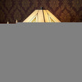 22" Dark Brown Metal Two Light Candlestick Table Lamp With Beige Shade