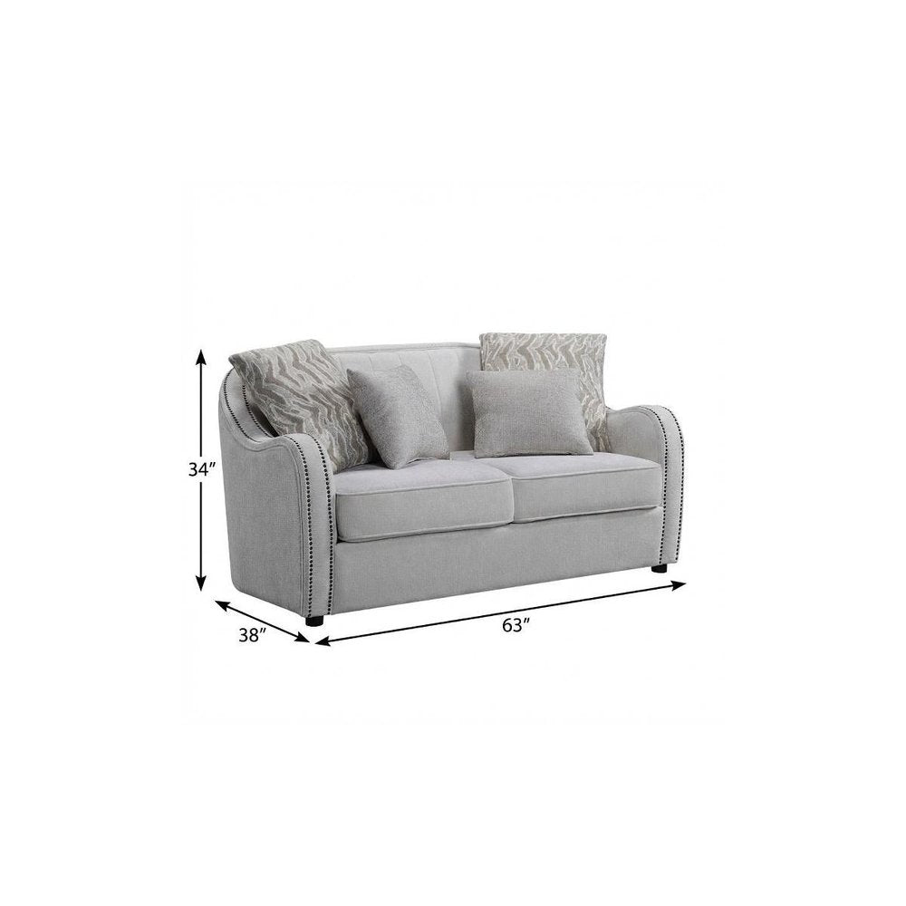 63" Beige And Black Linen Curved Loveseat and Toss Pillows