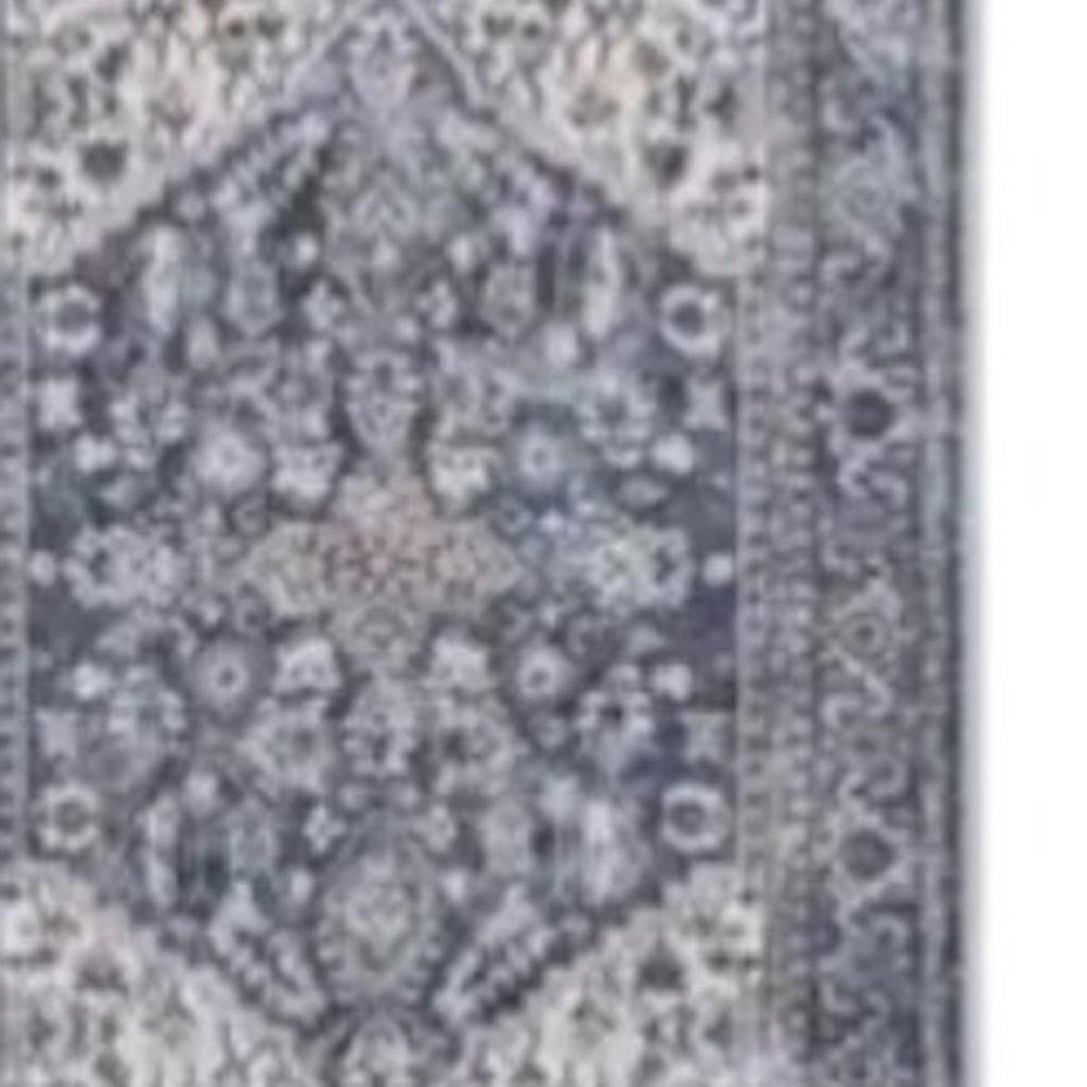 10' Blue and Ivory Floral Power Loom Distressed Washable Runner Rug
