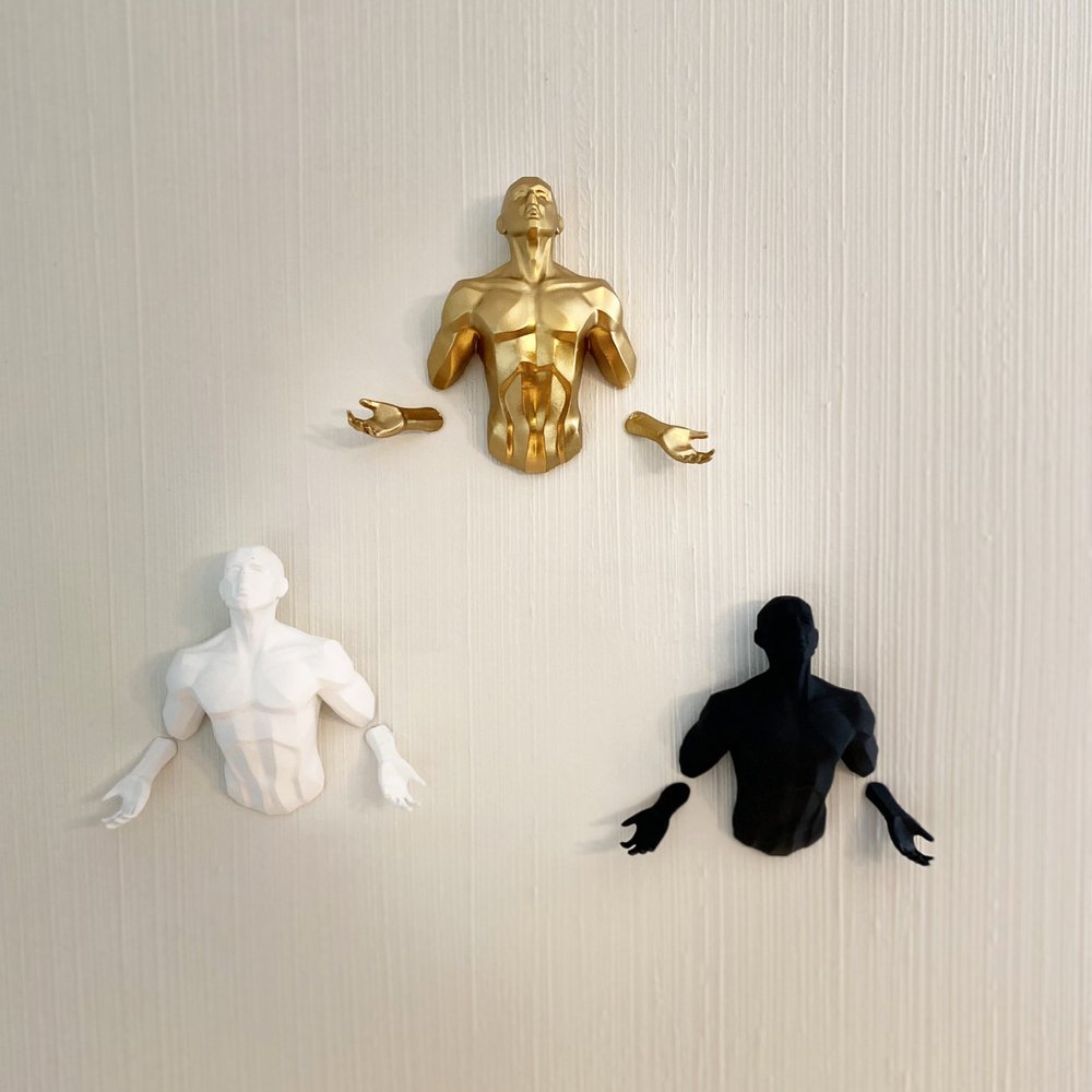 Set of Three Black Gold And White Resin Bursting Men Hanging Dimensional Sculpture