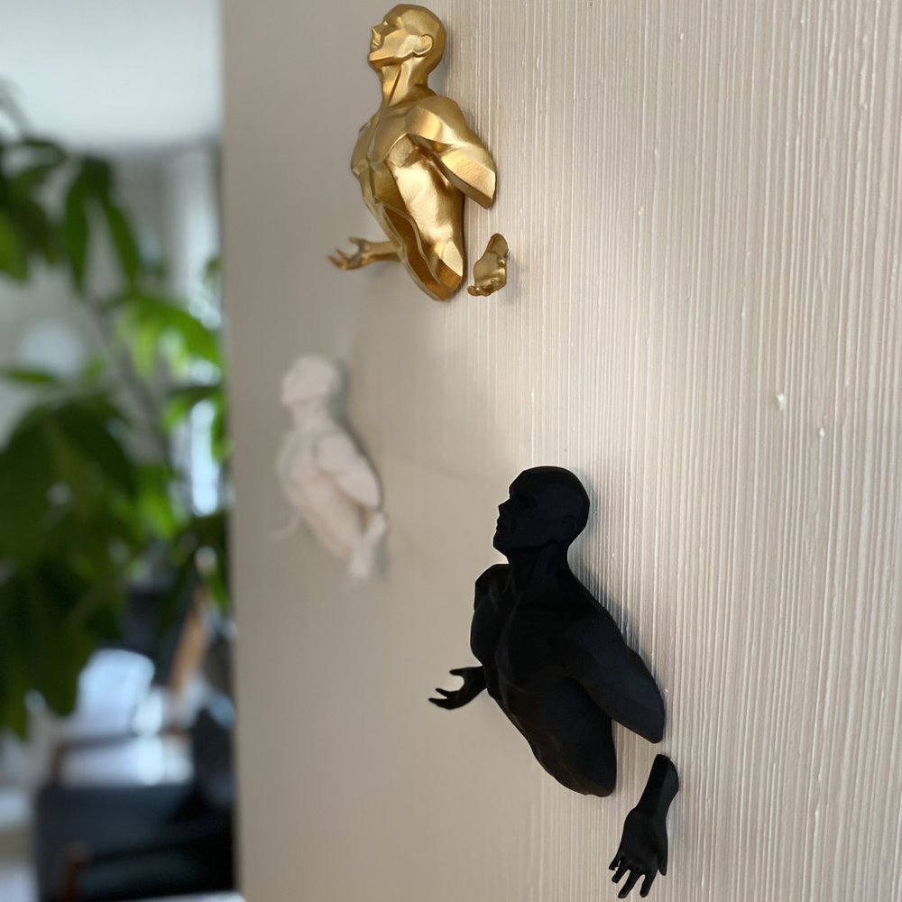 Set of Three Black Gold And White Resin Bursting Men Hanging Dimensional Sculpture