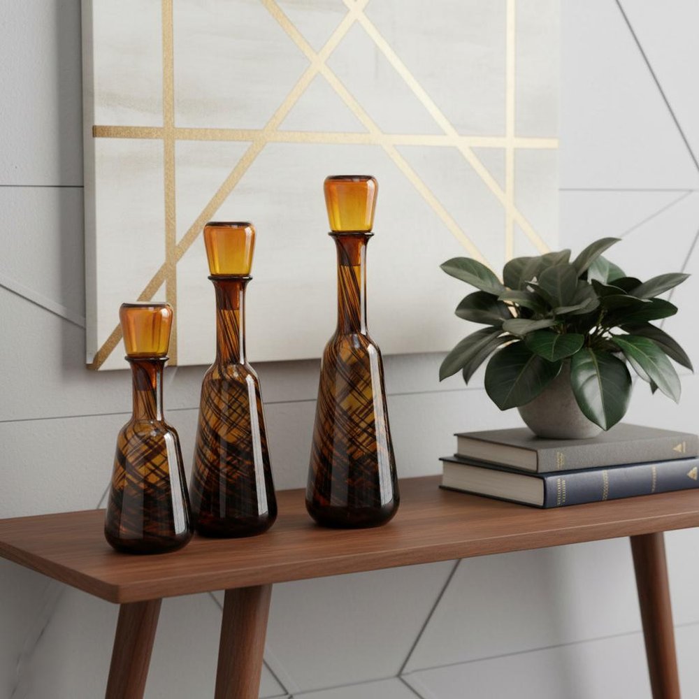 Set of Three Amber Abstract Swirl Glass Decorative Bottles With Stoppers