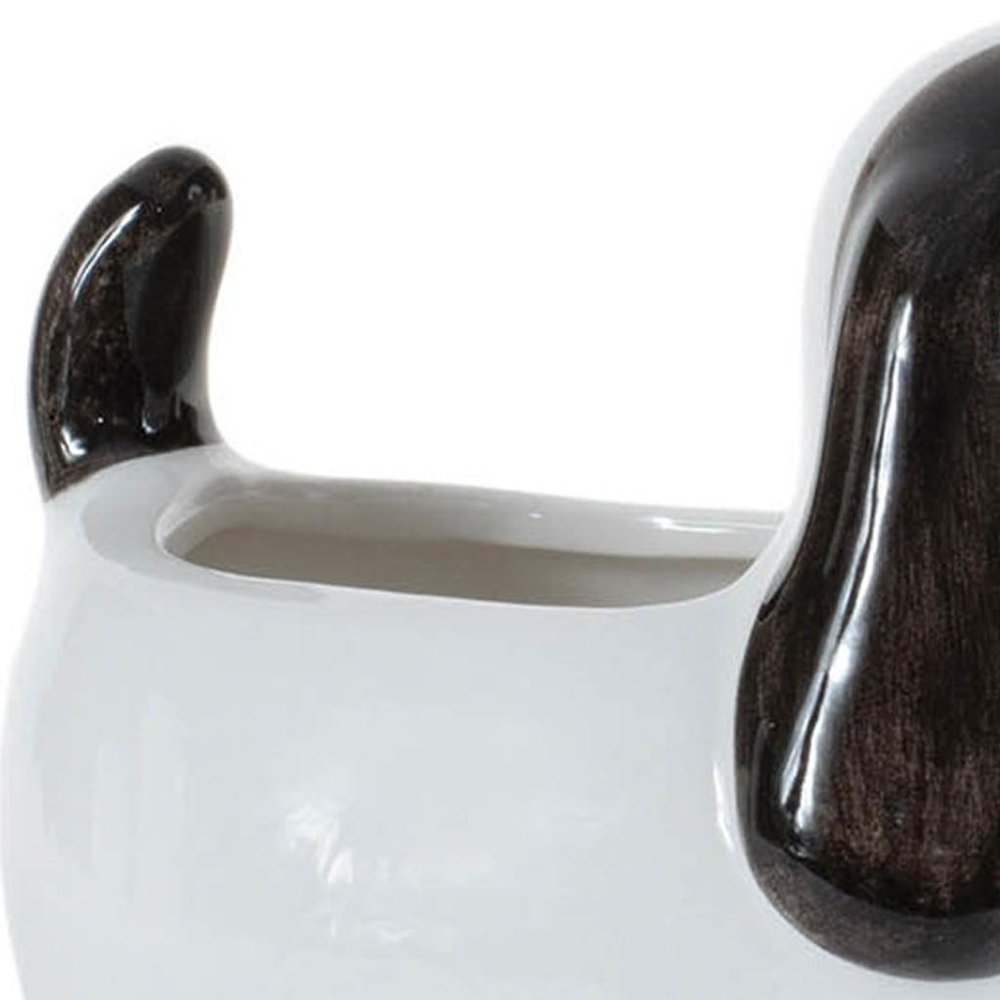 Set of Four Black And White Polyresin Dog Planters