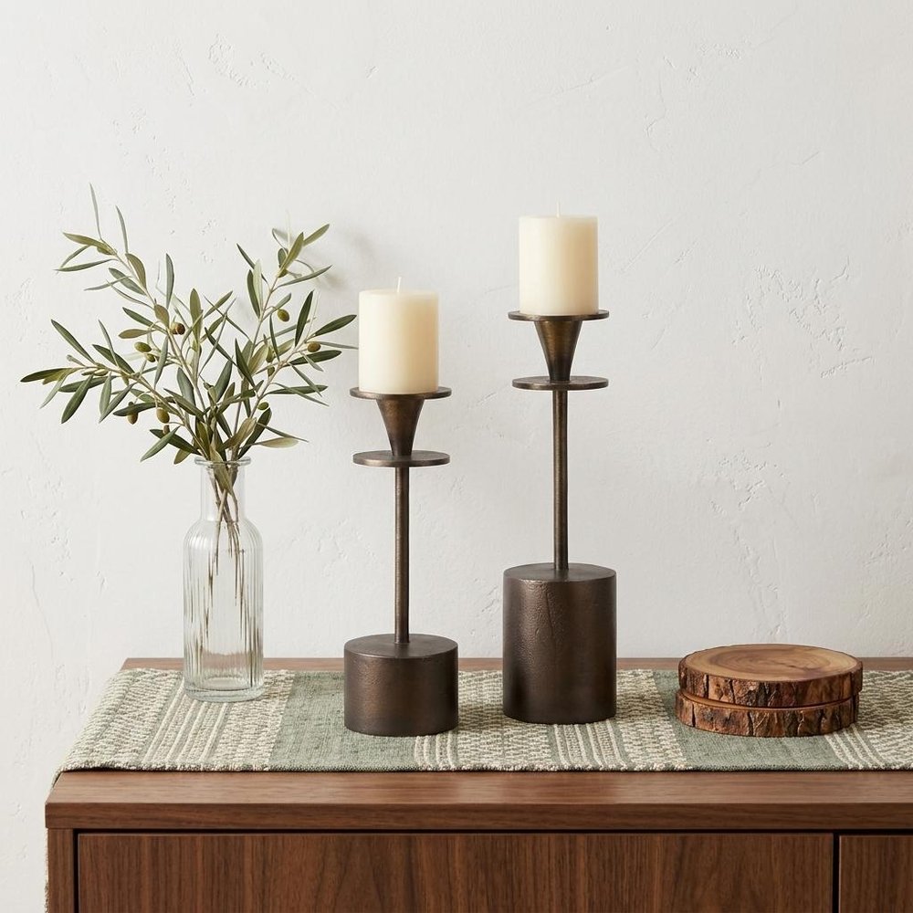 Set of Two Antiqued Gold Metal Floor Taper Candlesticks